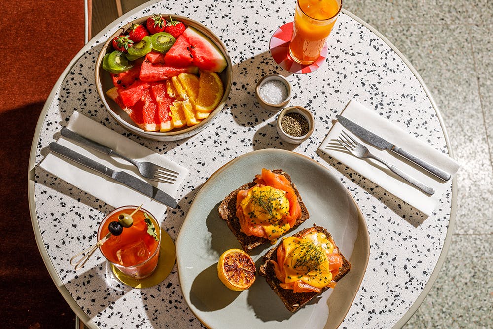 A mouthwatering spread of salmon, eggs, fresh fruit and smoothies from Feels Like June.